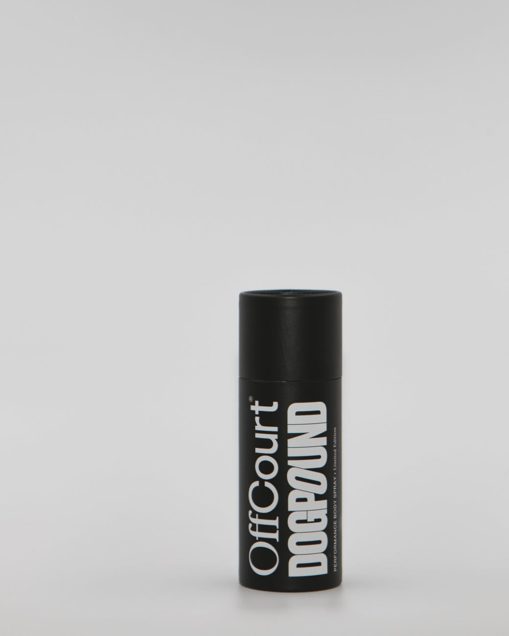 a can of dogpound body spray coming out of its outer packaging