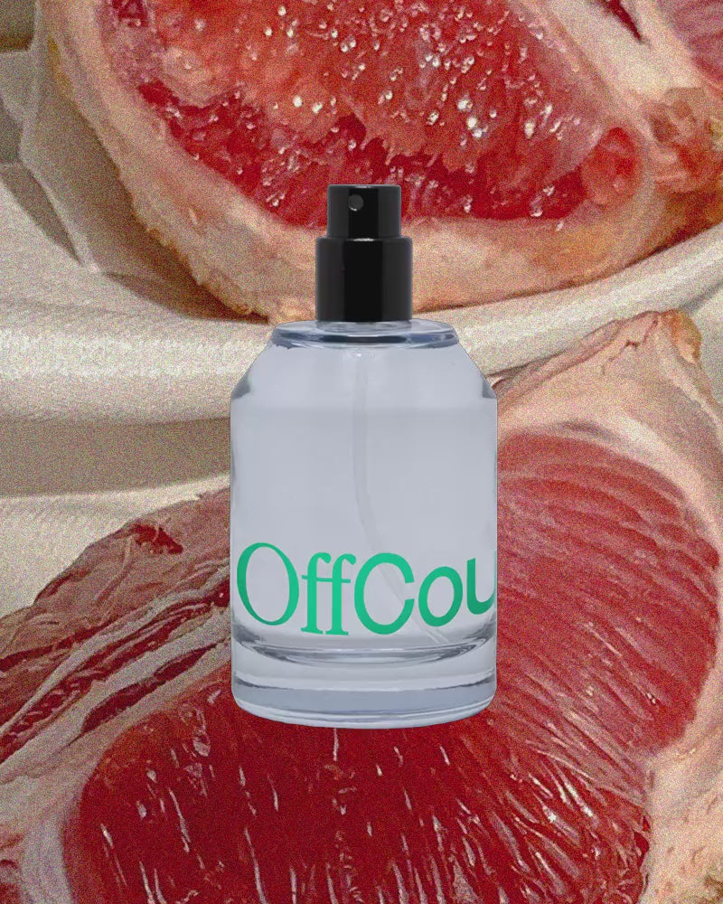 Fragrance bottle with moving images of ingredients: Grapefruit, Bergamot, Driftwood 