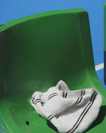 Woman washing her body with a soap