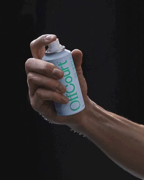 Spray Can in Hands of Person